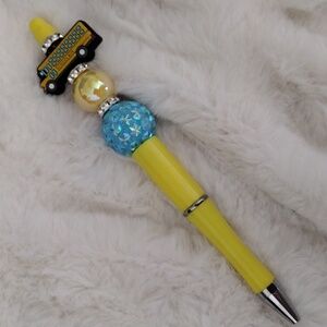 Yellow and Blue Decorative Pen